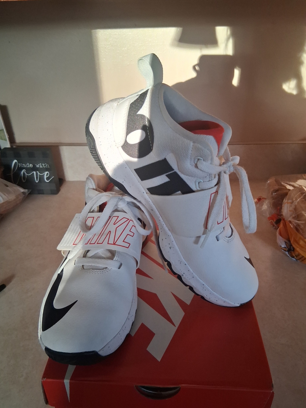Nike Kids White and Black Sneakers with Red Accents